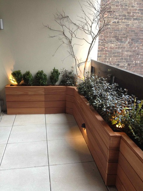 Terrace with custom planter box built with mahogany wood