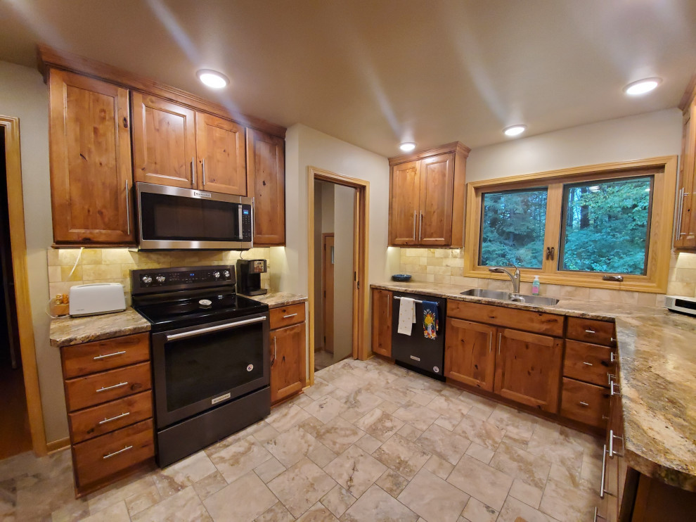 Kitchen - small transitional porcelain tile and beige floor kitchen idea with an undermount sink, recessed-panel cabinets, brown cabinets, laminate countertops, beige backsplash, porcelain backsplash, stainless steel appliances, no island and brown countertops