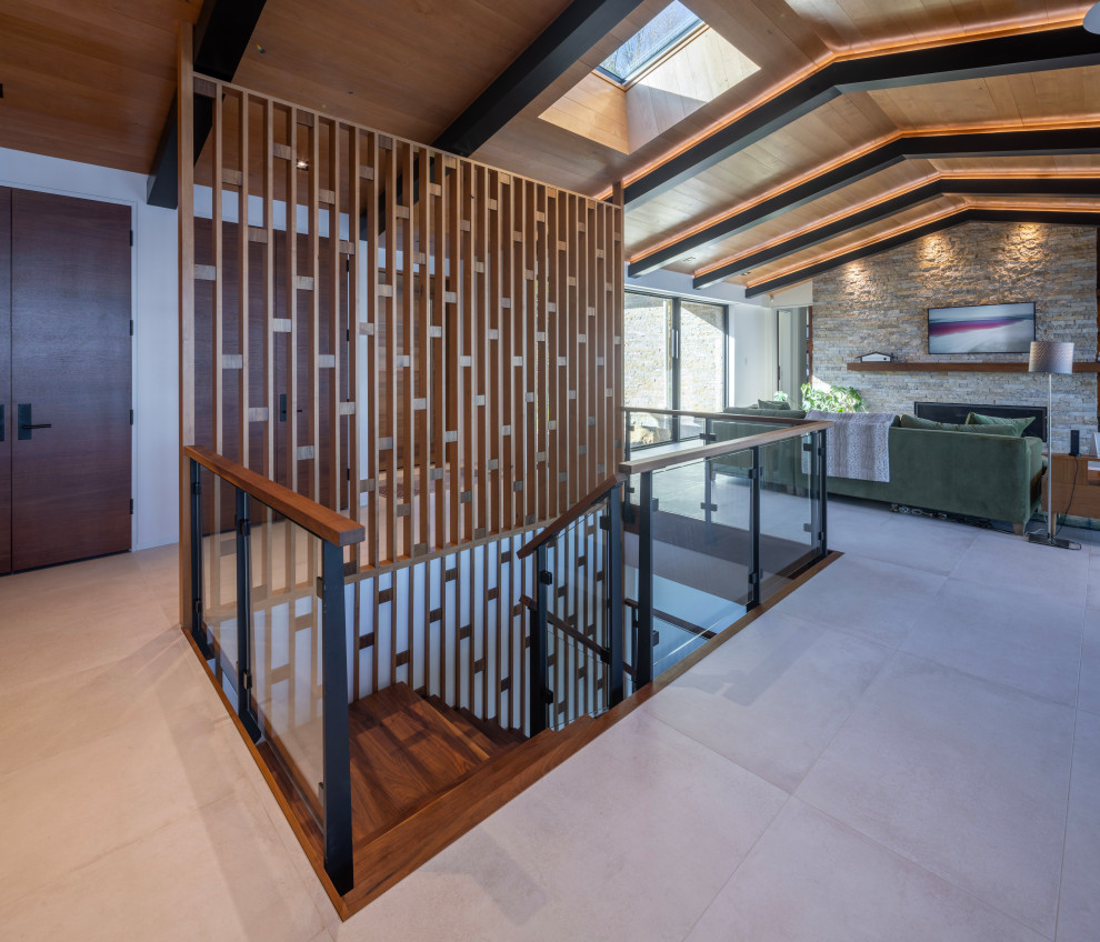 Staircase - mid-sized 1950s wooden u-shaped open and glass railing staircase idea