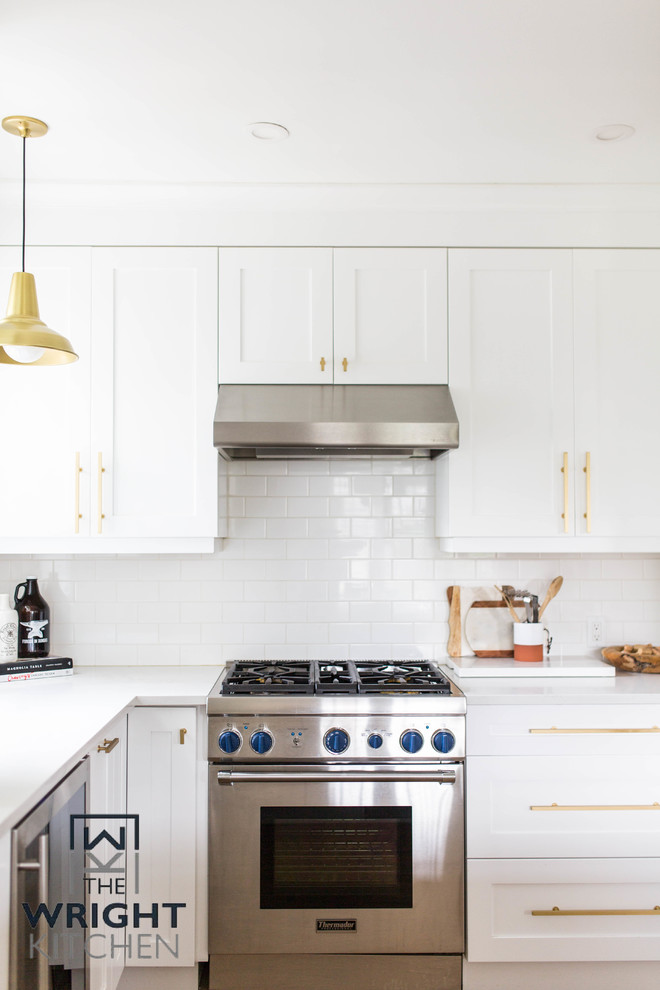 Example of a transitional kitchen design in Toronto