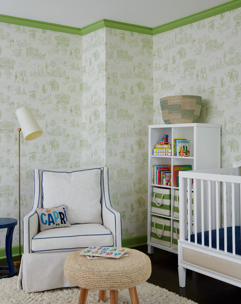 This is an example of a beach style nursery in Chicago with green walls, dark hardwood floors and brown floor.