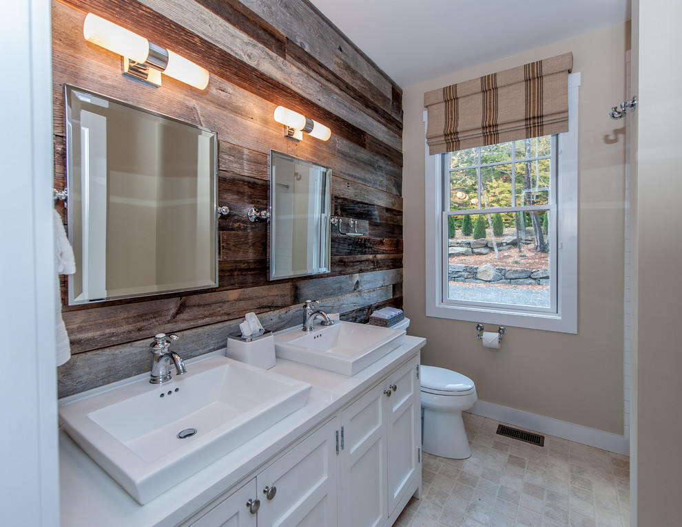 Small country master bathroom in Boston with a vessel sink, recessed-panel cabinets, white cabinets, quartzite benchtops, an alcove tub, an alcove shower, a two-piece toilet, beige tile, stone tile, beige walls, travertine floors and beige floor.