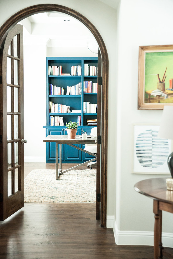 Inspiration for a mid-sized transitional medium tone wood floor and brown floor foyer remodel in Dallas with gray walls and a medium wood front door