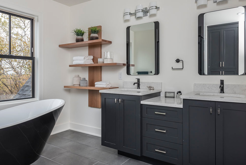 Example of a transitional master bathroom design in Minneapolis