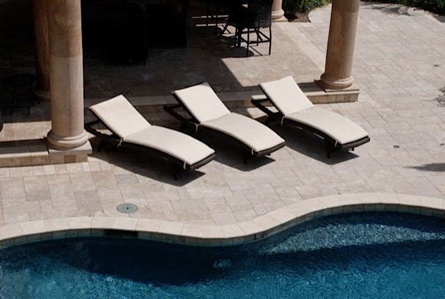 Photo of a mediterranean pool in Dallas.