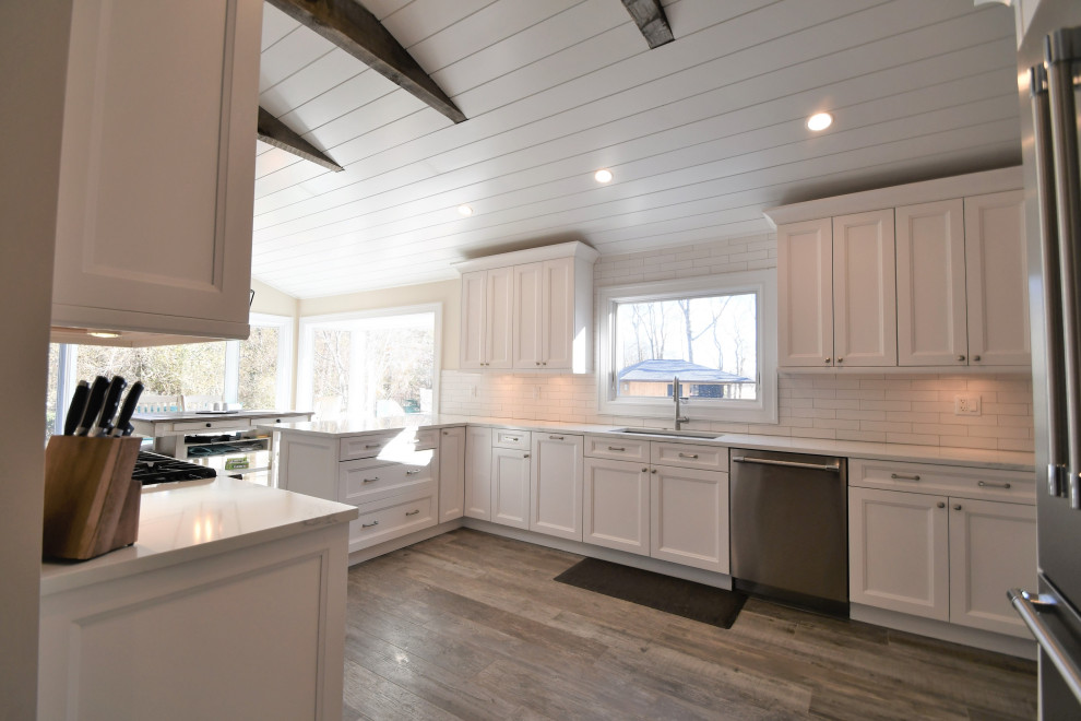 Example of a transitional kitchen design in New York
