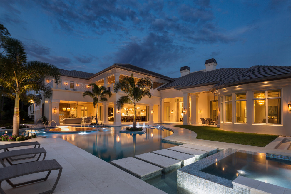 Hot tub - large transitional backyard custom-shaped natural hot tub idea in Miami