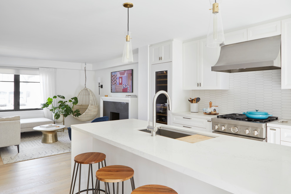 Example of a transitional kitchen design in Toronto