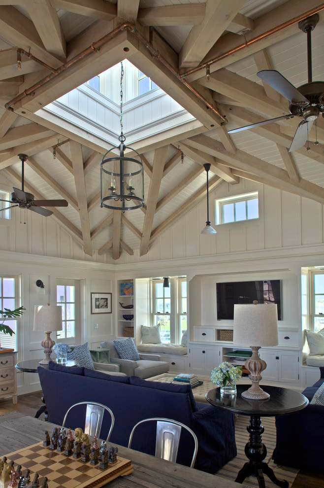 This is an example of a beach style family room in Other.