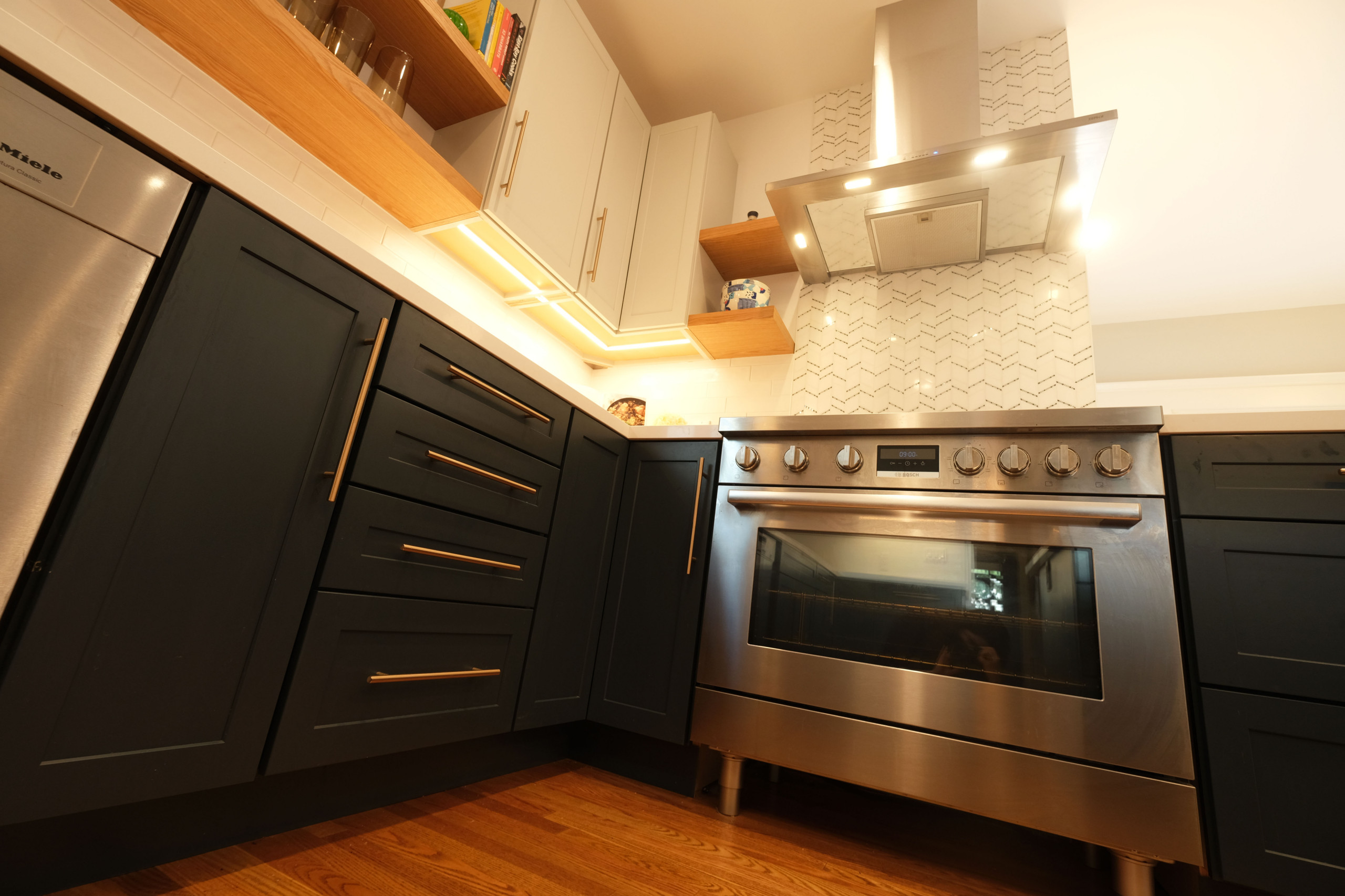Contemporary Navy Kitchen with Brass Accents