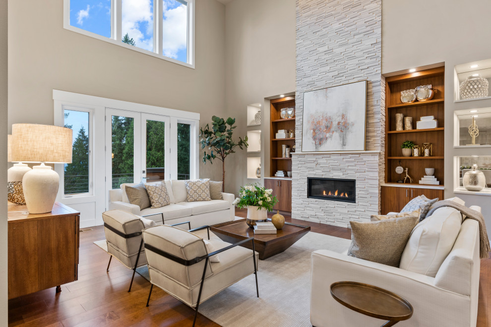 Photo of a contemporary formal open concept living room in Seattle with beige walls, medium hardwood floors, a ribbon fireplace, no tv and brown floor.