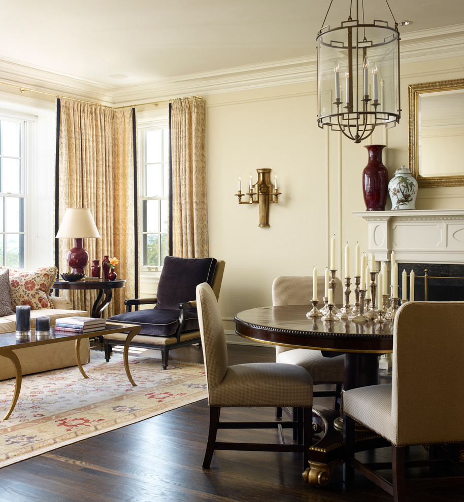 Inspiration for a traditional living room in Chicago with beige walls and dark hardwood floors.