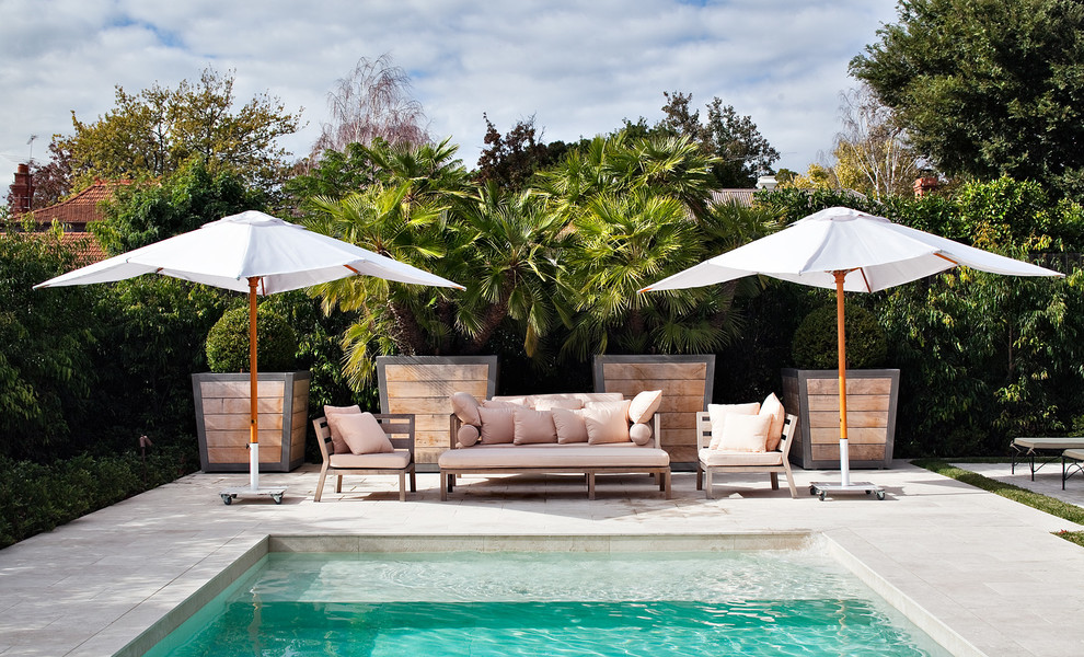 Tropical patio in Sydney with no cover.