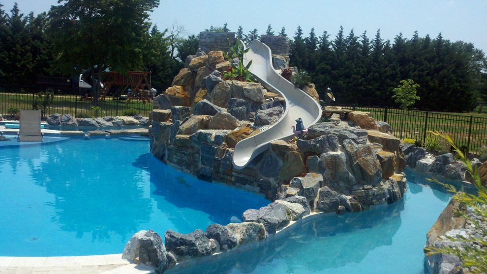 Large Pool with boulder waterfall ,water slide and a lazy river