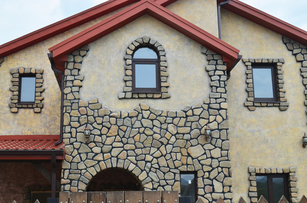 Применение камня песчаника-плитняка в облицовке фасада (стен дома)