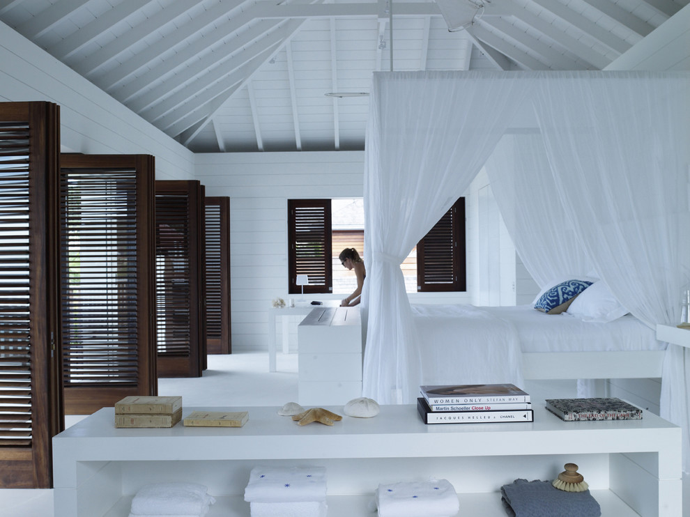 Photo of an expansive tropical bedroom in Other.