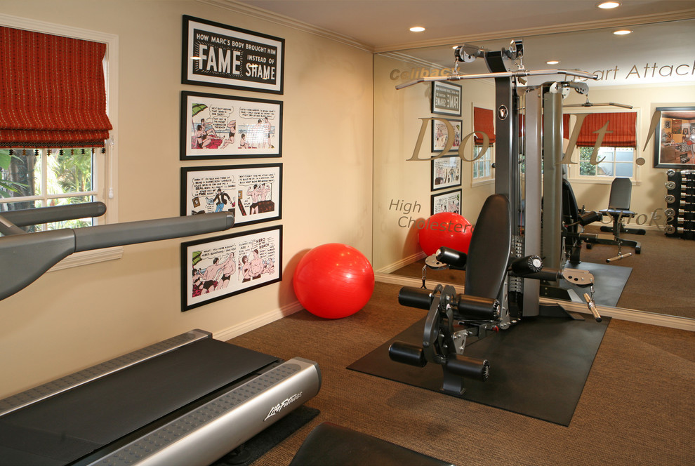 Design ideas for a transitional home gym in Los Angeles with brown floor.