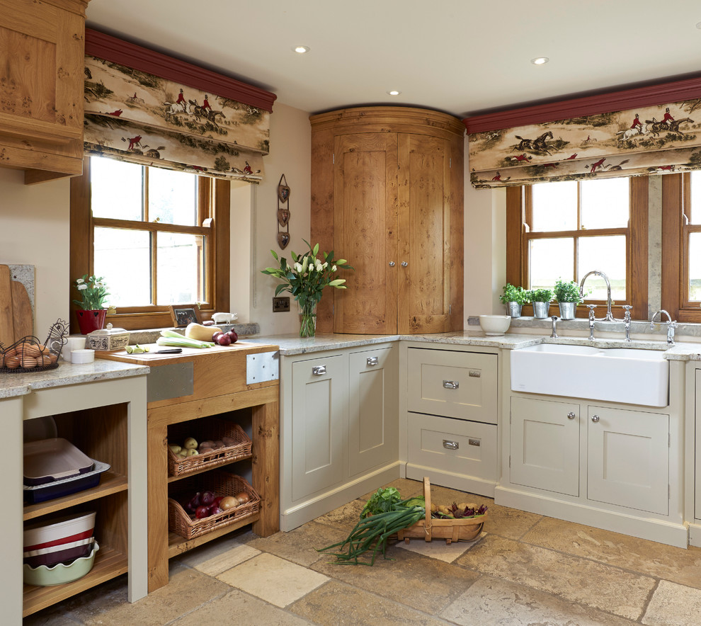 Design ideas for a country l-shaped kitchen in Other with a farmhouse sink, recessed-panel cabinets and beige cabinets.