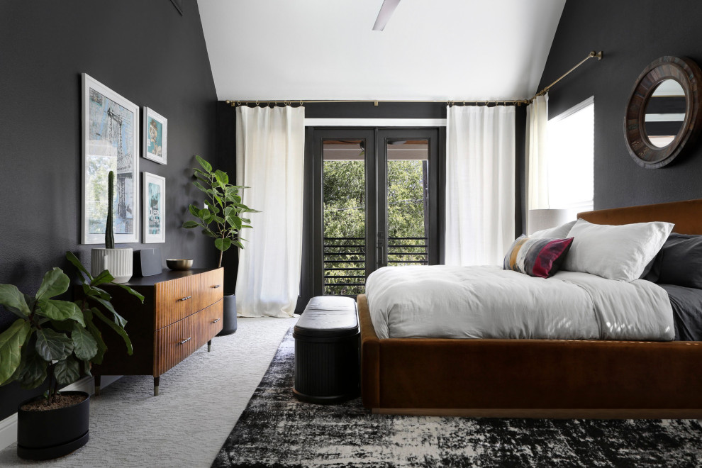 Inspiration for a large modern master bedroom in Dallas with black walls, vaulted, carpet and white floor.