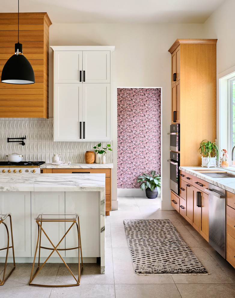 Eat-in kitchen - transitional eat-in kitchen idea with white cabinets