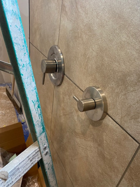 ADA Bathroom/Garage Retrofit and New Flooring