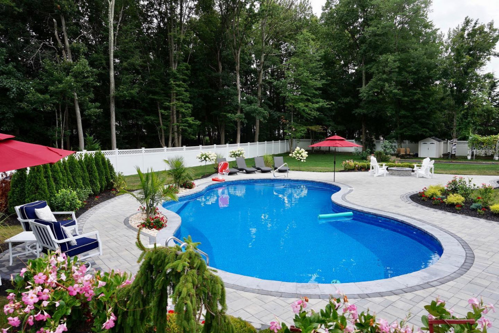 Manalapan, NJ: Freeform Paver Patio with Pool installation & Firepit