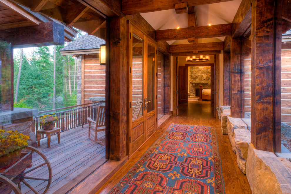 Photo of a country hallway in Seattle with medium hardwood floors.