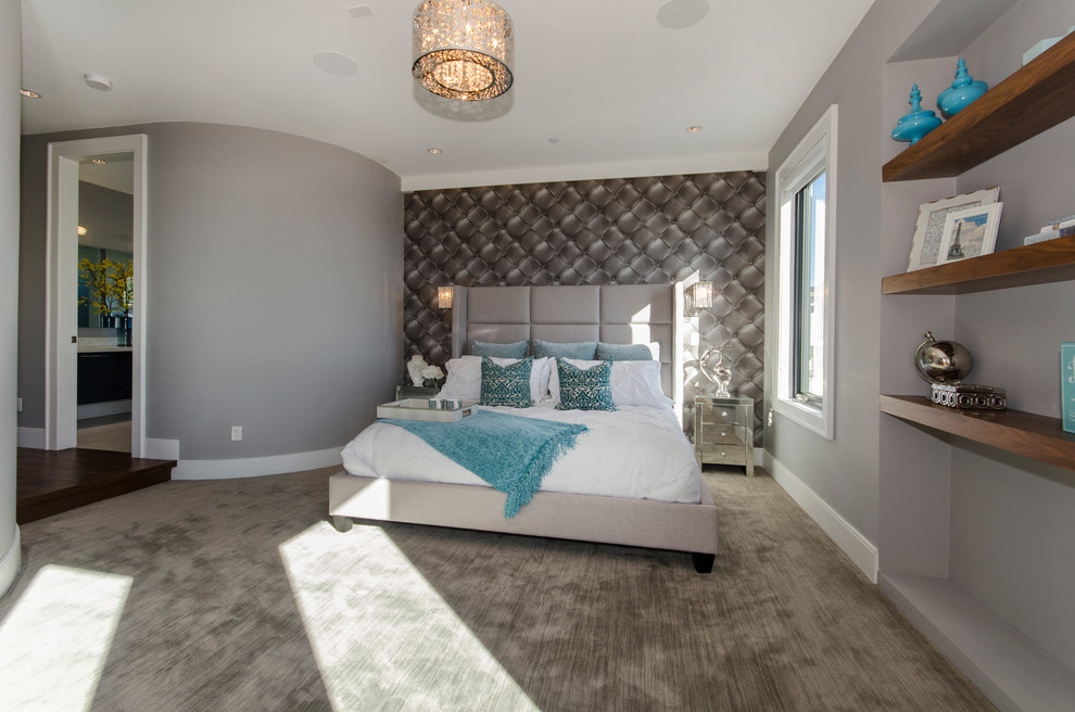 Photo of a mid-sized transitional master bedroom in Vancouver with grey walls and carpet.