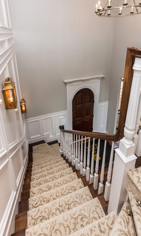 Example of an eclectic staircase design in Cedar Rapids