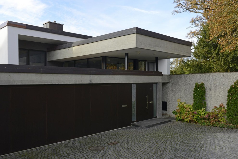 Photo of a modern home design in Munich.