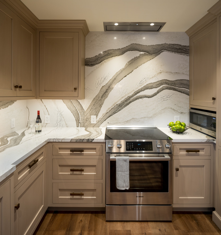 Small classic u-shaped kitchen pantry in Other with a submerged sink, beige cabinets, engineered stone countertops, multi-coloured splashback, engineered quartz splashback, stainless steel appliances, vinyl flooring, brown floors and multicoloured worktops.