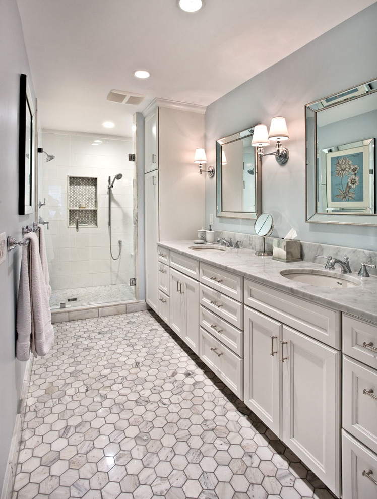 Design ideas for a traditional master bathroom in Minneapolis with recessed-panel cabinets, white cabinets, a double shower, ceramic tile, blue walls, ceramic floors, an undermount sink, granite benchtops and white tile.