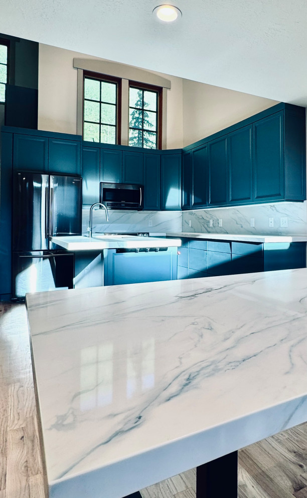 Custom kitchen cabinets, matching countertops, island, back splash, new custom t