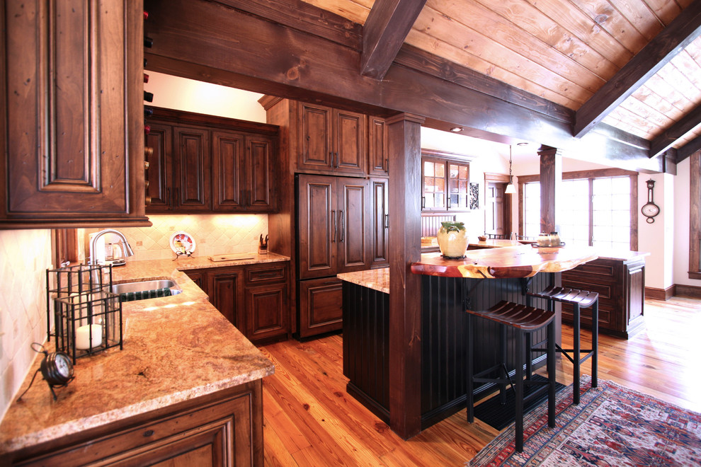 Mountain style eat-in kitchen photo in Charlotte with an undermount sink and medium tone wood cabinets