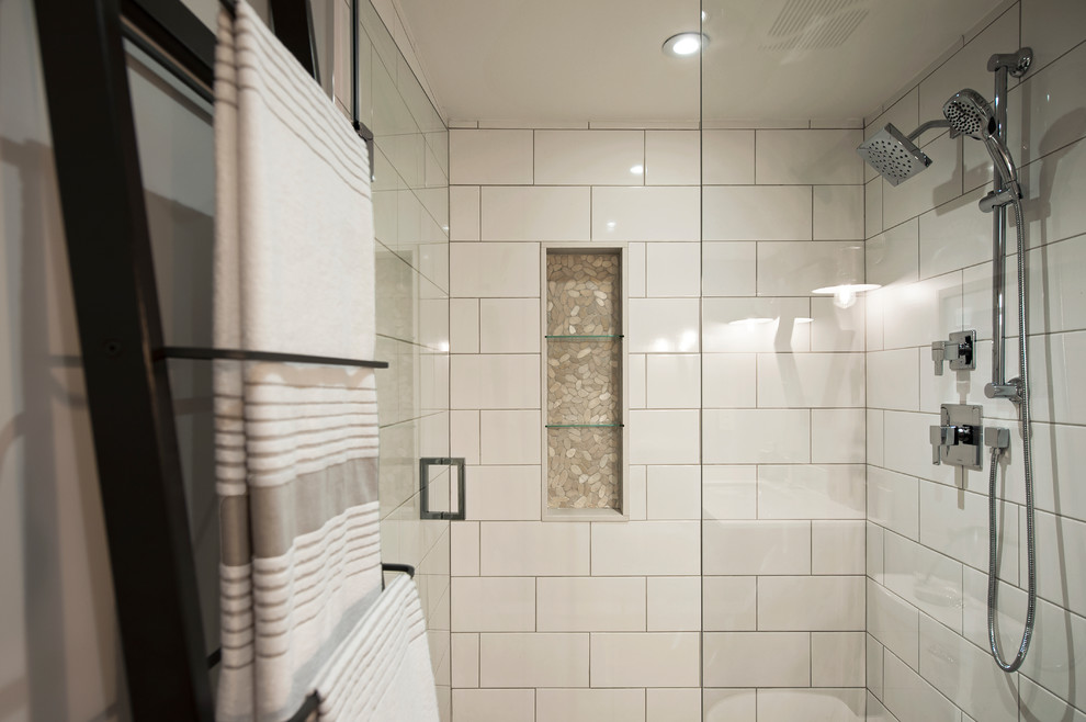Photo of a large contemporary 3/4 bathroom in Toronto with grey walls, beige floor, beaded inset cabinets, grey cabinets, an alcove shower, a one-piece toilet, white tile, porcelain tile, porcelain floors, an undermount sink, engineered quartz benchtops and a hinged shower door.