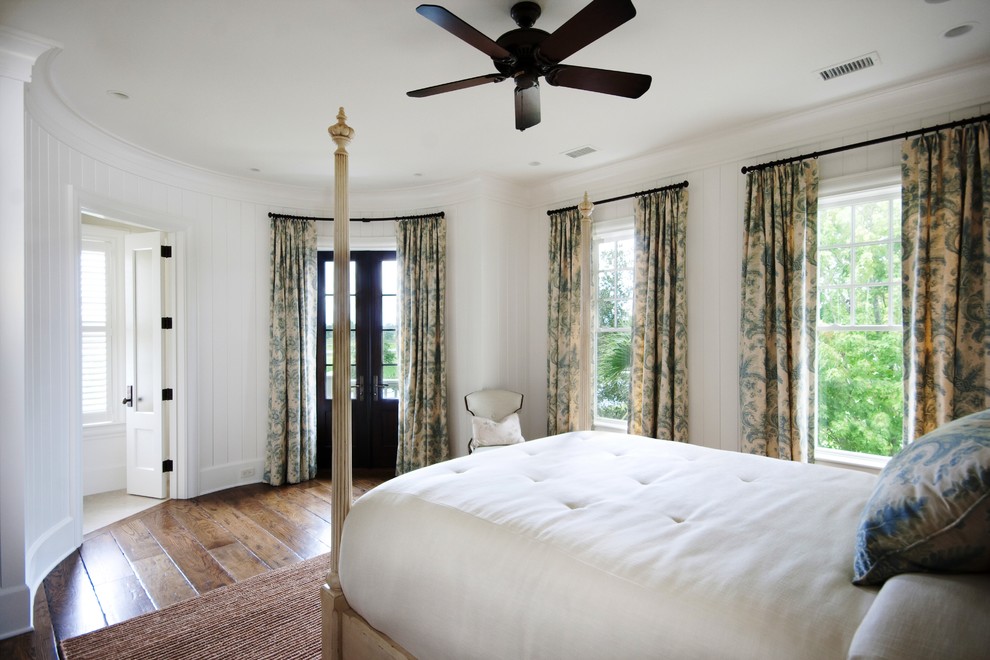 Traditional bedroom in Charleston with white walls.