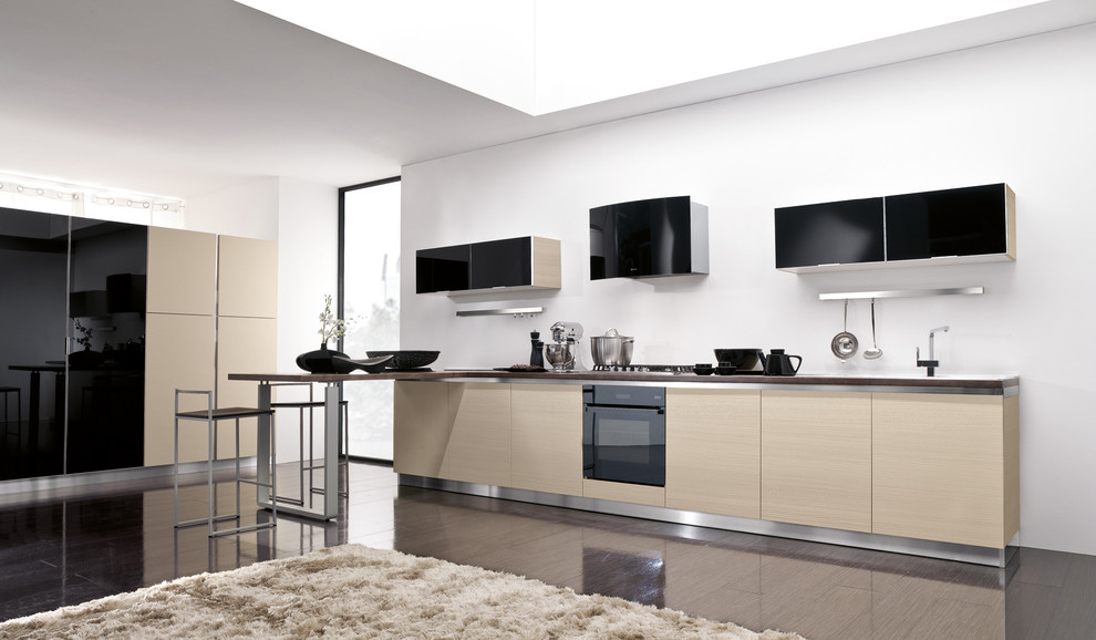 This is an example of a mid-sized modern single-wall eat-in kitchen in San Diego with a double-bowl sink, flat-panel cabinets, black cabinets, granite benchtops, white splashback, ceramic splashback, panelled appliances, ceramic floors and no island.