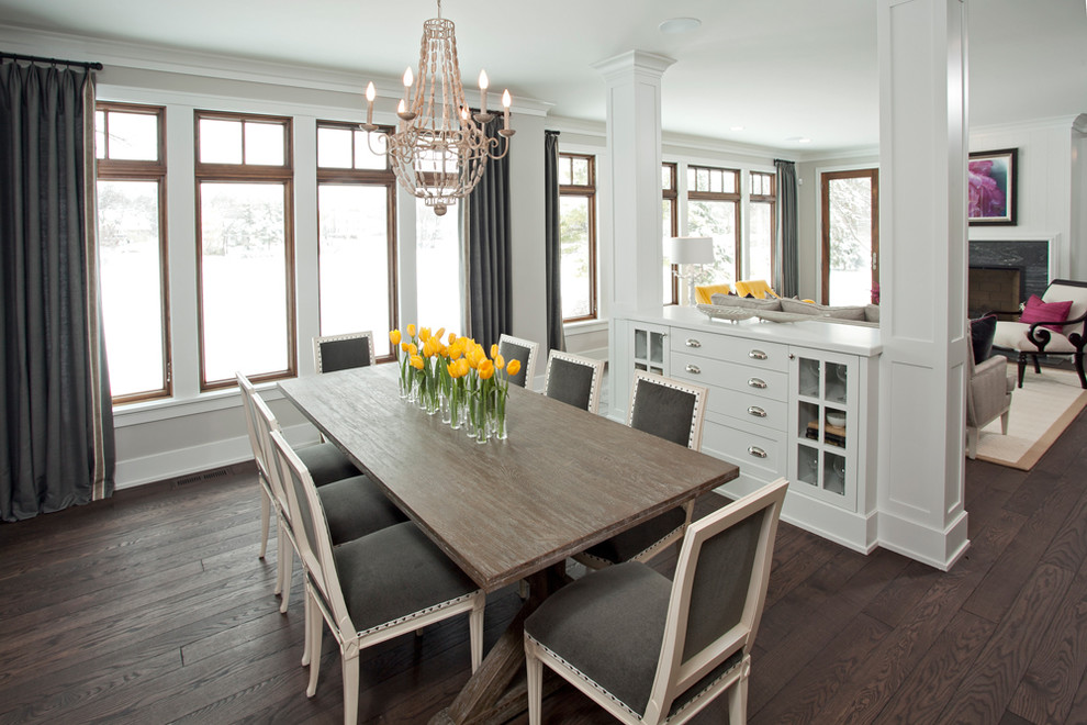 Mid-sized transitional dining room in Minneapolis with white walls, dark hardwood floors and no fireplace.