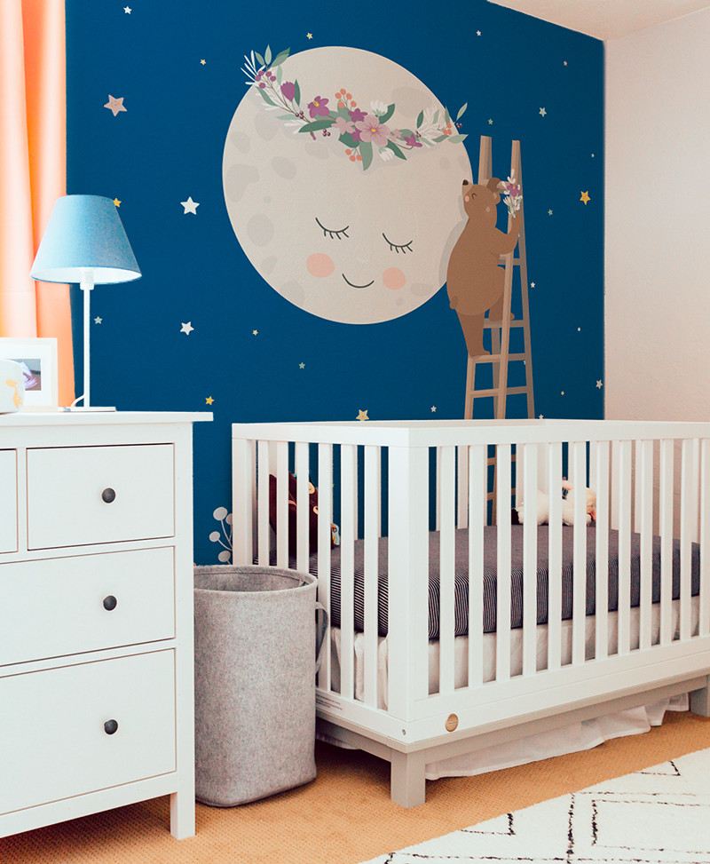 Design ideas for a modern gender neutral nursery in Milan with wallpapered walls.