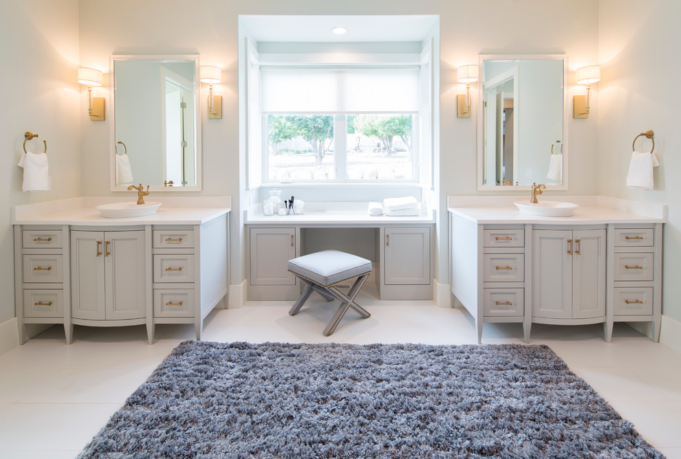 Inspiration for a large transitional master bathroom in Salt Lake City with recessed-panel cabinets, grey cabinets, a freestanding tub, porcelain tile, blue walls, porcelain floors, a vessel sink and engineered quartz benchtops.
