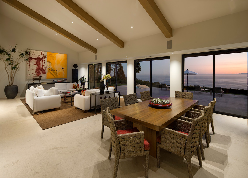 This is an example of a contemporary open plan dining in Santa Barbara with beige walls and no fireplace.