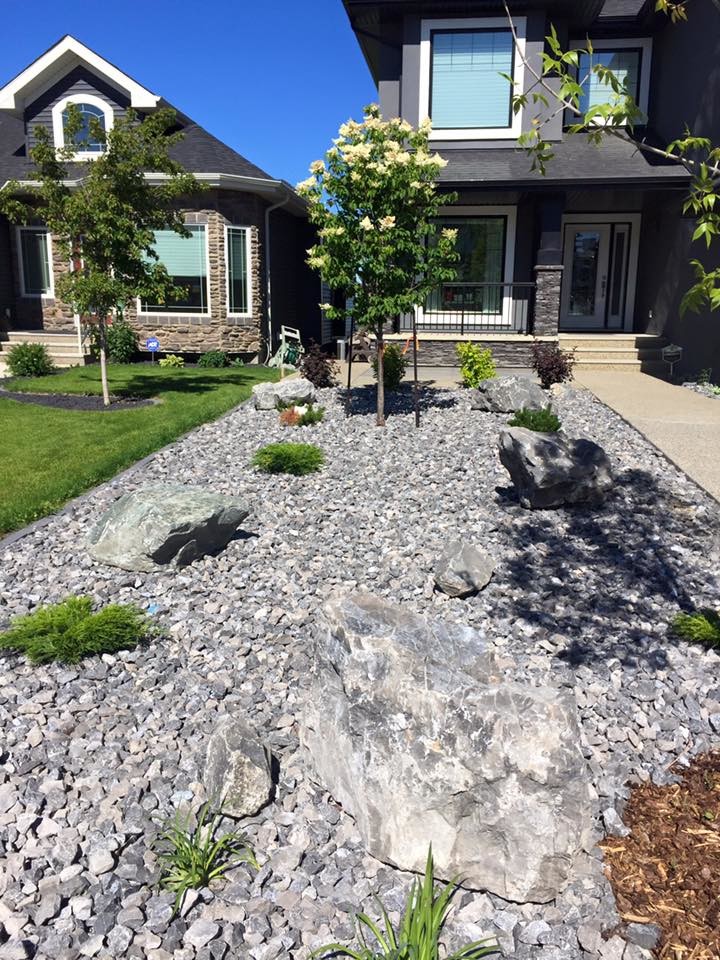 Inspiration for a mid-sized asian backyard partial sun formal garden for spring in Orange County with gravel.