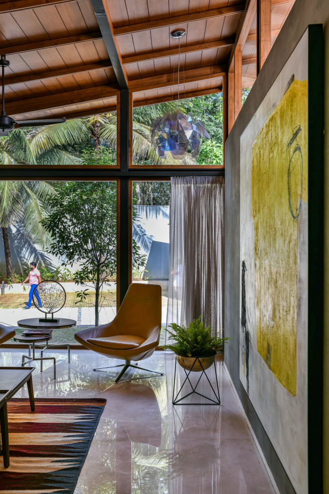 Design ideas for a tropical living room in Mumbai.