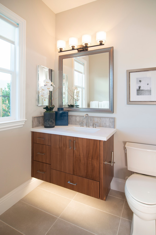 Inspiration for a contemporary bathroom in San Francisco with flat-panel cabinets and medium wood cabinets.