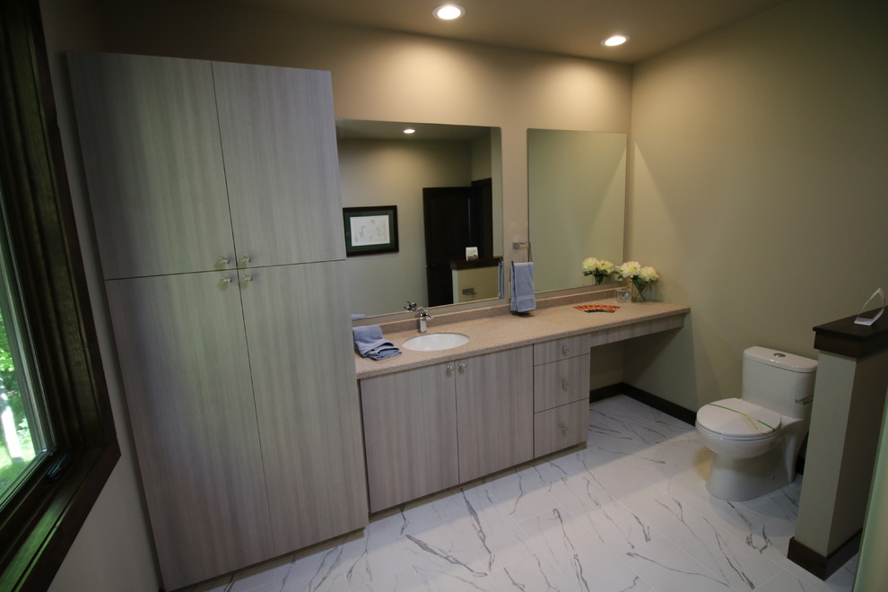 Design ideas for a mid-sized modern 3/4 bathroom in Other with flat-panel cabinets, beige cabinets, white walls, ceramic floors, an undermount sink and terrazzo benchtops.