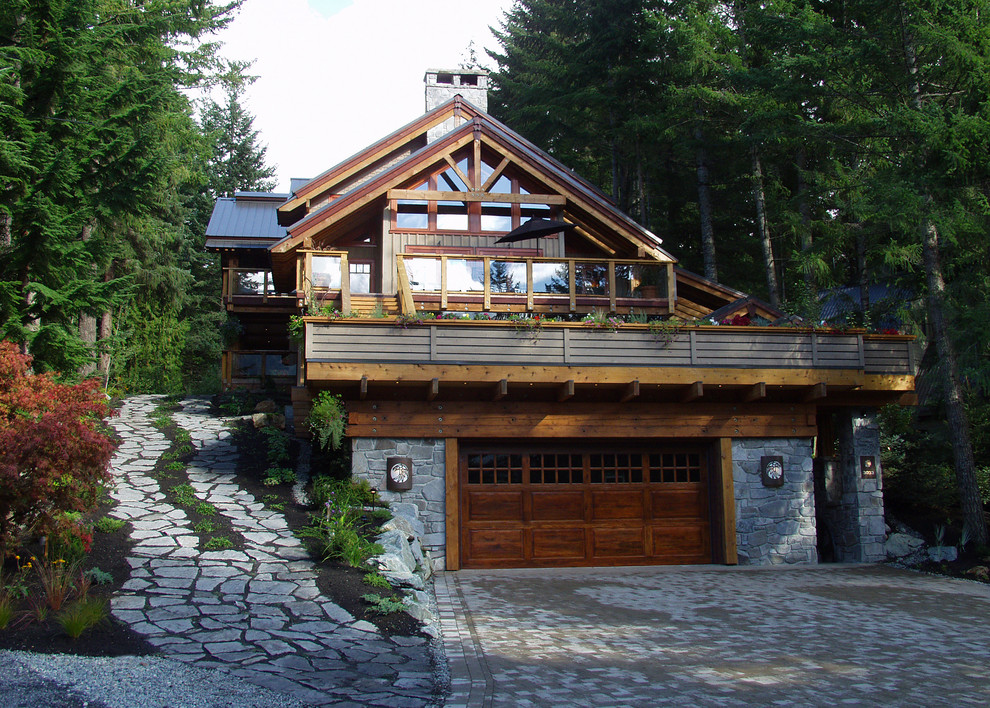 Inspiration for a contemporary exterior in Vancouver with stone veneer.