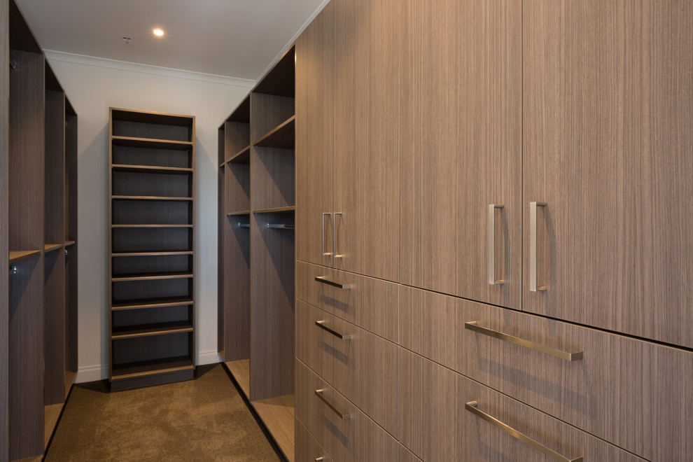 Design ideas for a large contemporary storage and wardrobe in Auckland.