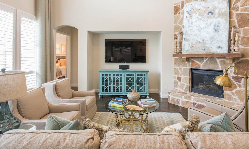 Photo of a mid-sized traditional open concept living room in Dallas with white walls, dark hardwood floors, a corner fireplace, a stone fireplace surround, a wall-mounted tv and brown floor.