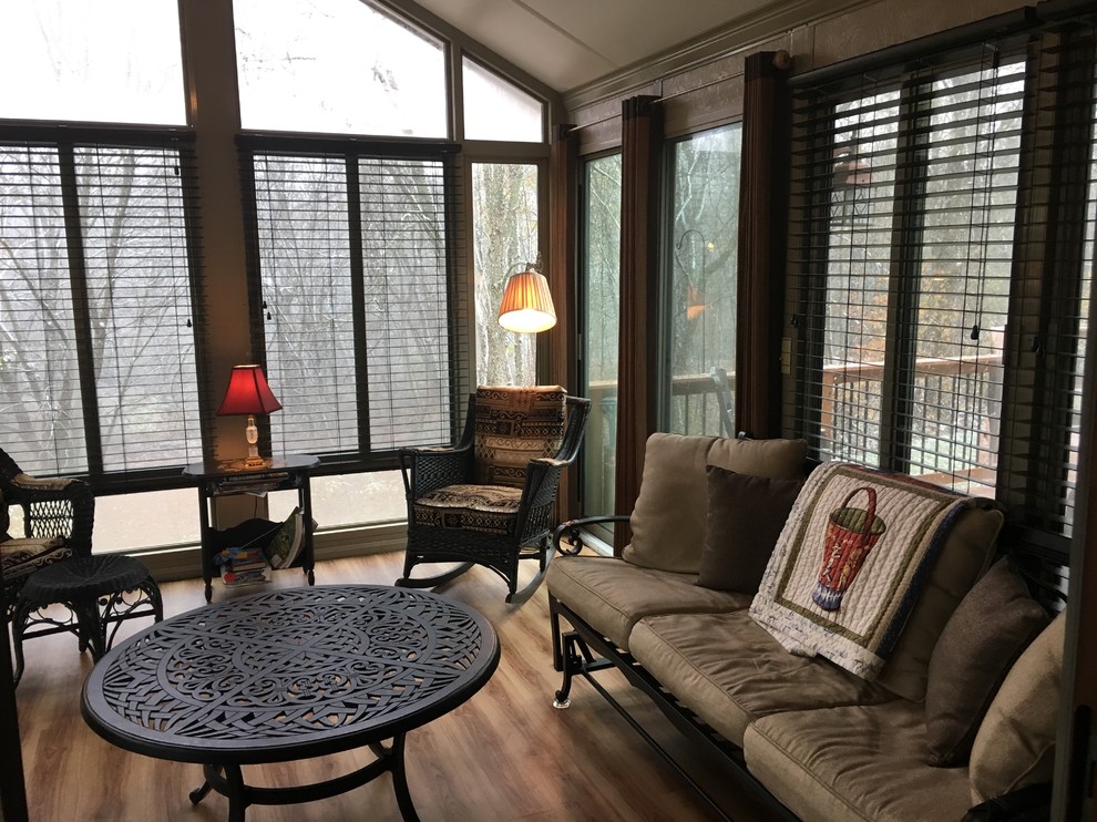 Inspiration for a small traditional sunroom in Grand Rapids with medium hardwood floors, no fireplace and a standard ceiling.