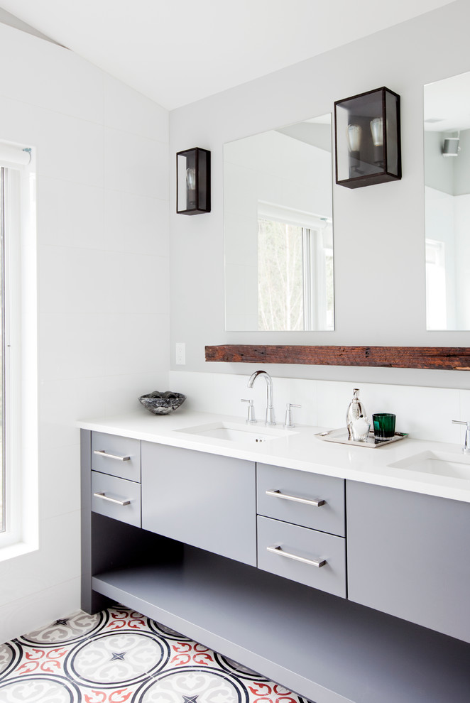 Design ideas for a large contemporary master bathroom in Vancouver with flat-panel cabinets, grey cabinets, white tile, porcelain tile, white walls, ceramic floors, an undermount sink and engineered quartz benchtops.
